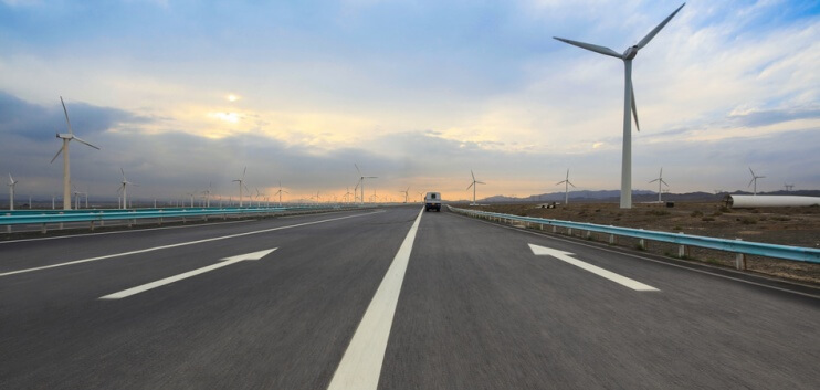 highway with wind turbines